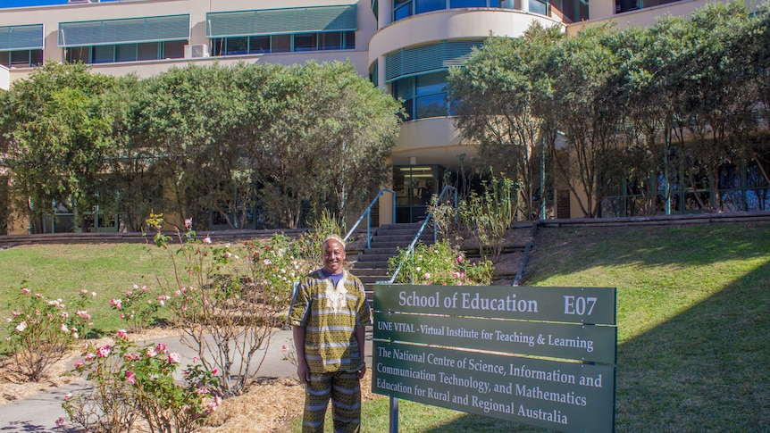 Mutuota Kigotho outside School of Education at UNE