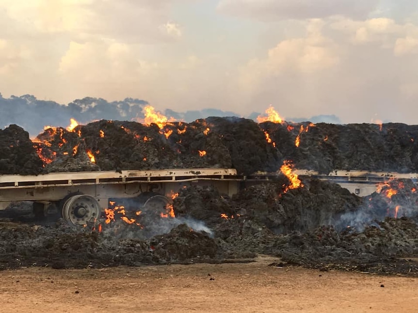 A  burning hay truck.