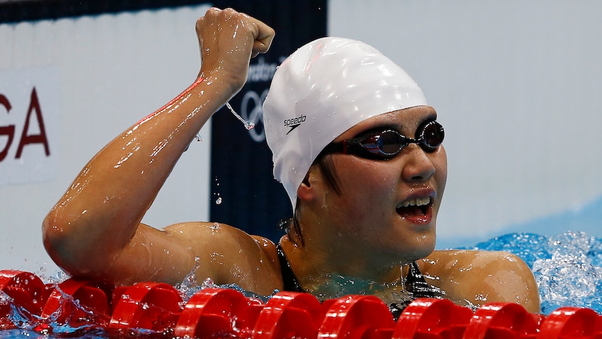 China's Ye Shiwen celebrates winning gold in the women's 400m individual medley final