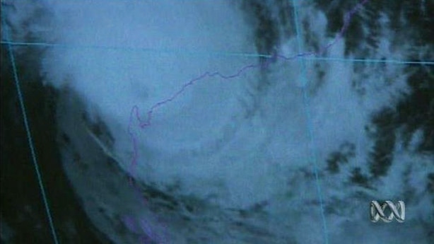 A satellite weather chart shows a cyclone