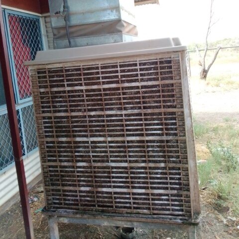 an old rusty air conditioner