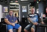 Ashley Brown (L) and Gary Strachan (R) in hair salon seats.