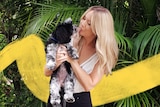 Kellie Scott holding dog Peppa
