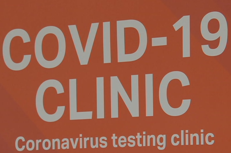 A red sign saying COVID-19 CLINIC
