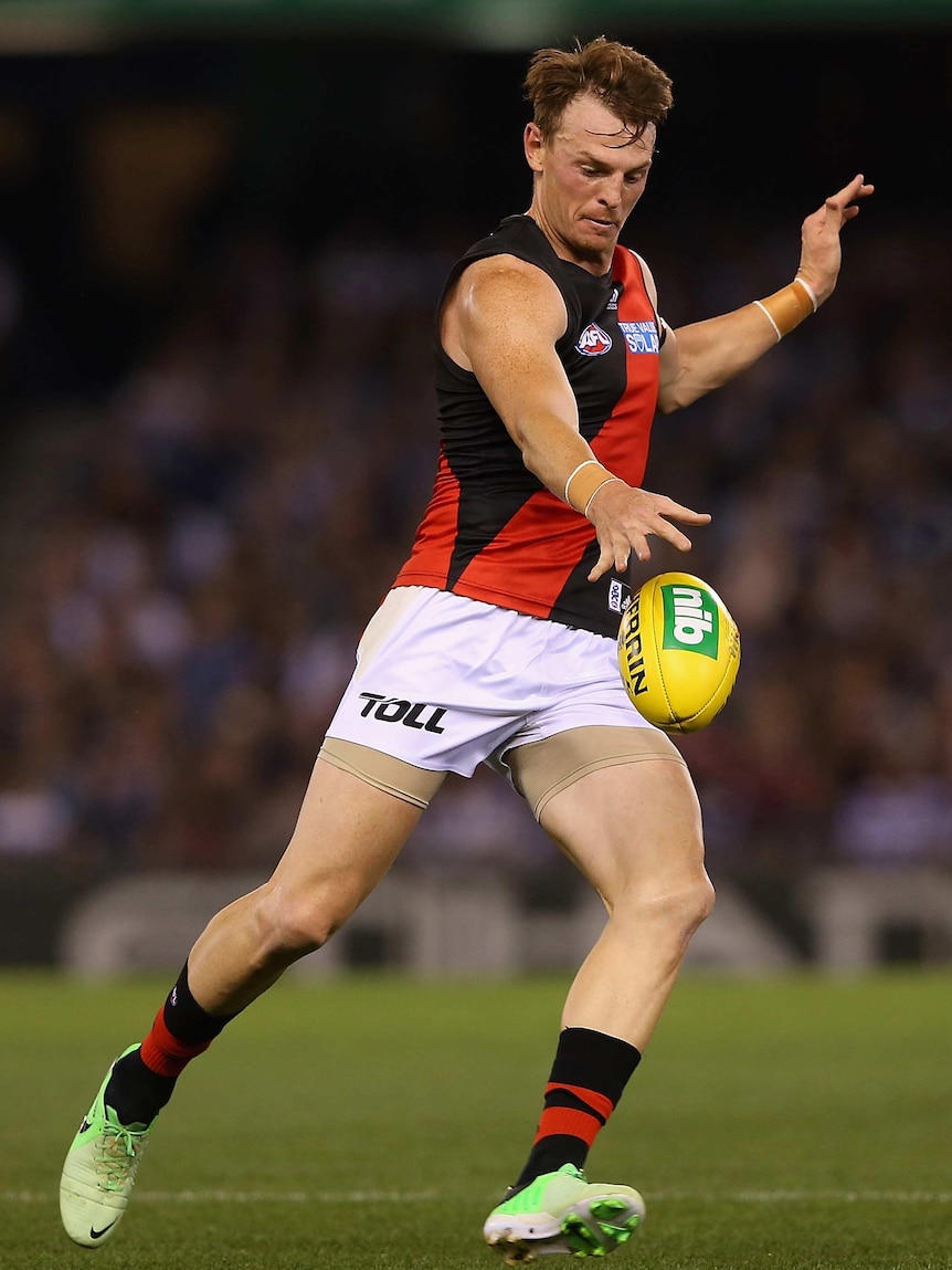 Telling the truth ... Brendon Goddard kicks ahead during the clash with the Cats