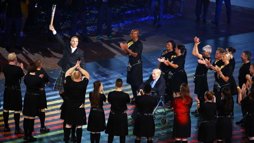 Queen's Baton arrives in arena