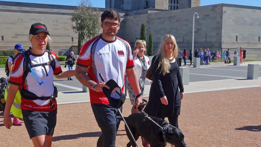 Private Liam Haven and his guide dog Omen were accompanied on the charity walk by a team from Soldier On.