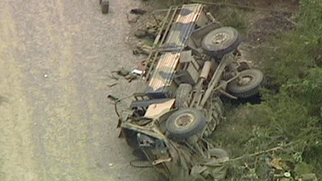 The troops were thrown from the vehicle when it rolled on a dirt road during a training exercise.