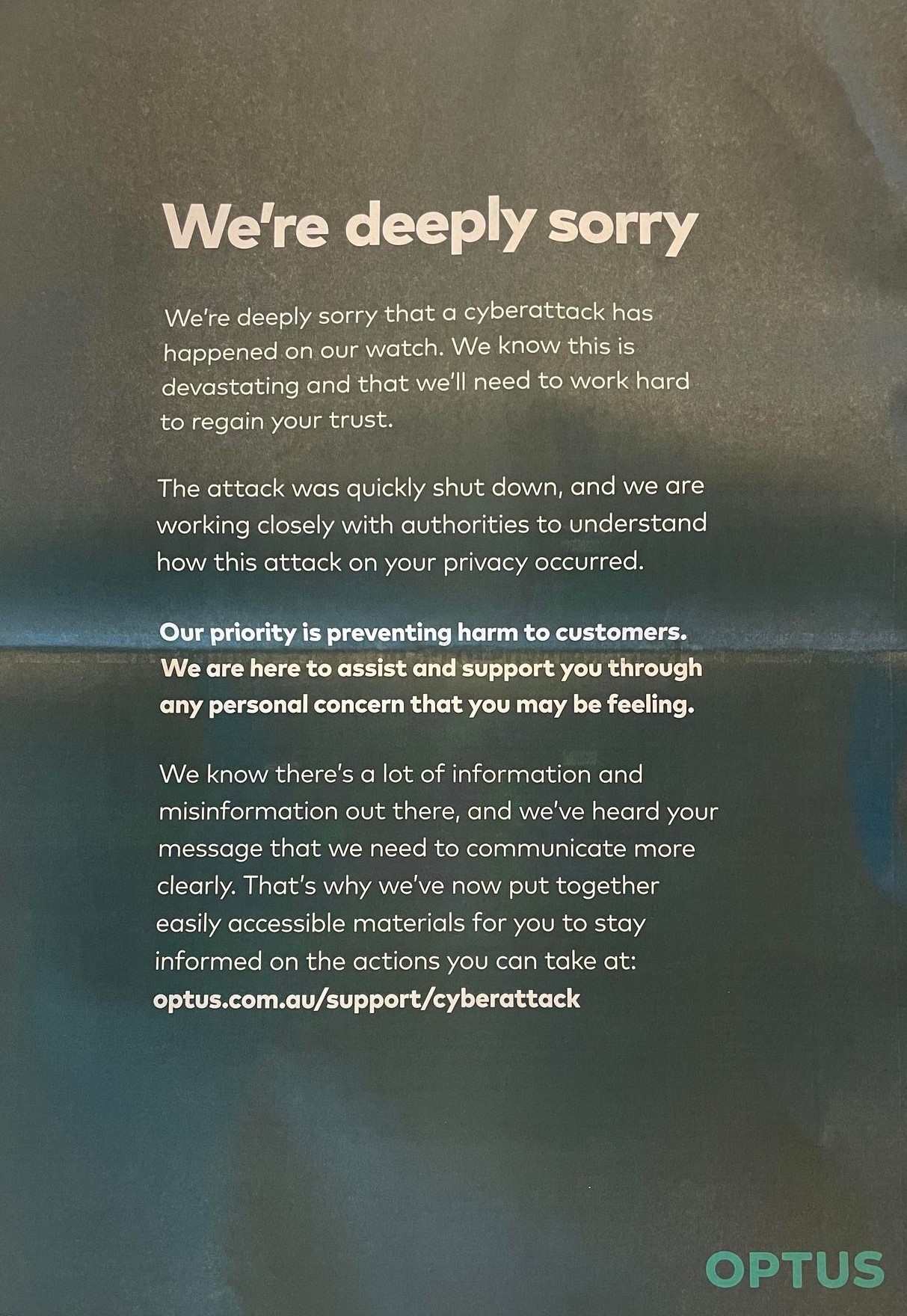 Optus's full page ad, which says "We're deeply sorry that a cyberattack has  happened on our watch".