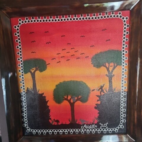 A painting of a red and orange sunset with trees and a hunter in the foreground.