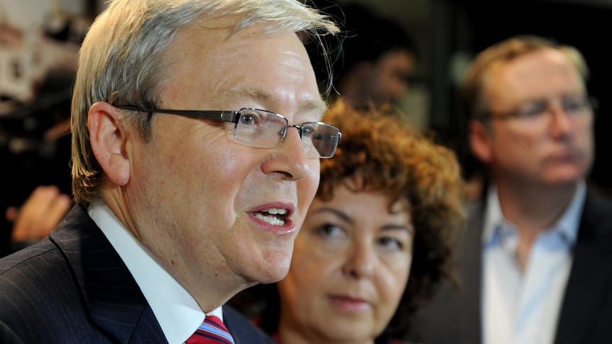 Kevin Rudd speaks to the media at Brisbane airport after returning from the US.