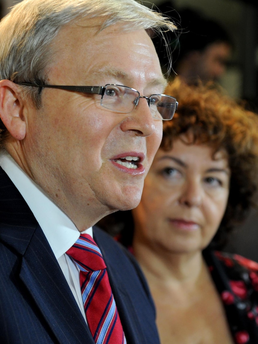 Kevin Rudd speaks to the media at Brisbane airport after returning from the US.