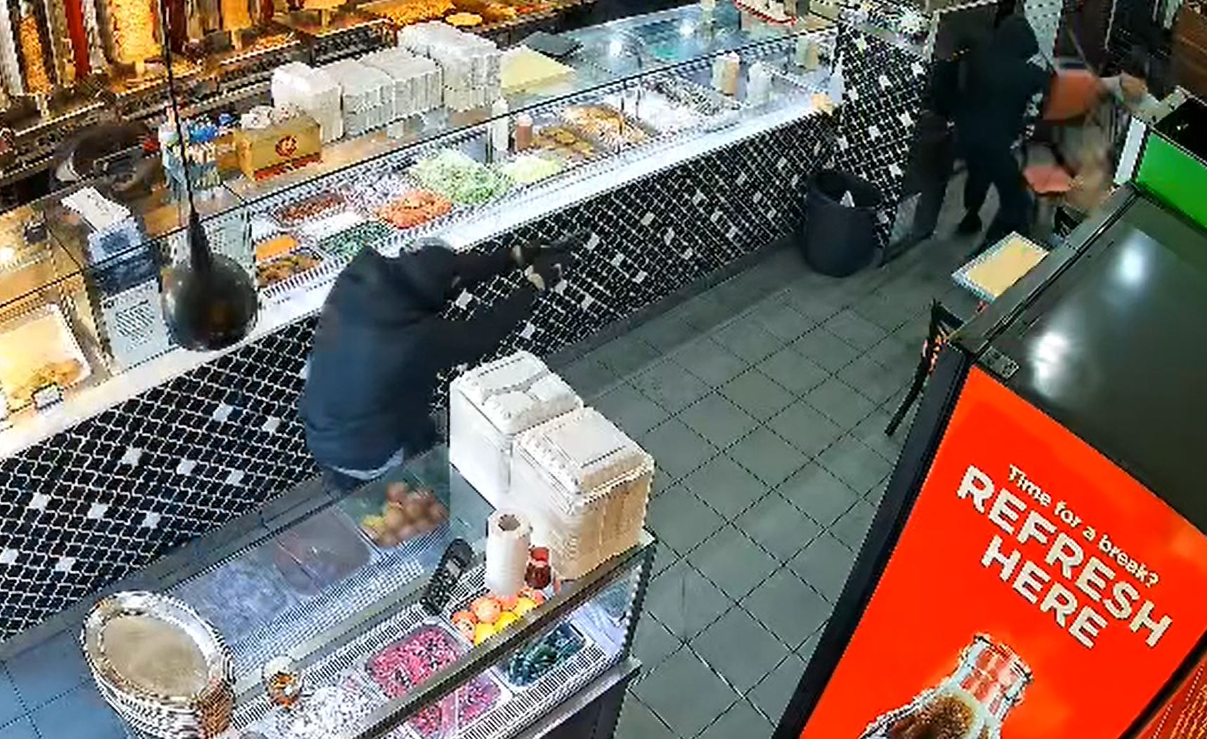 CCTV footage of a shooting in an Auburn kebab shop 
