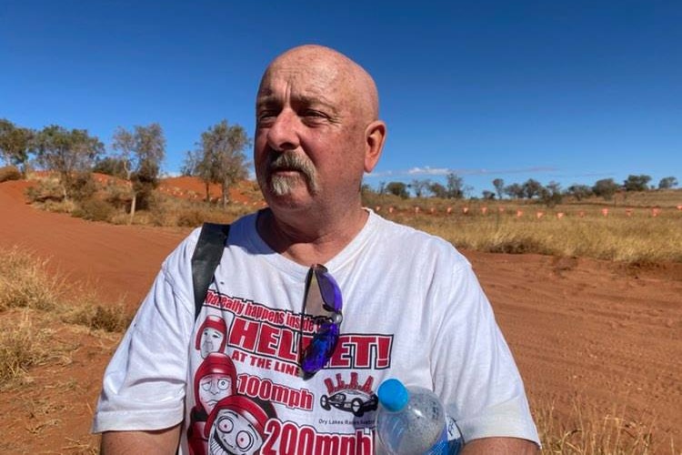 Don Macaulay stands outside at the location of Finke Desert Race,