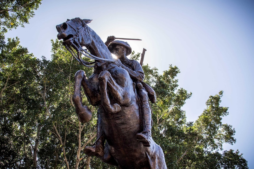 A bronze statue of a Light Horseman.