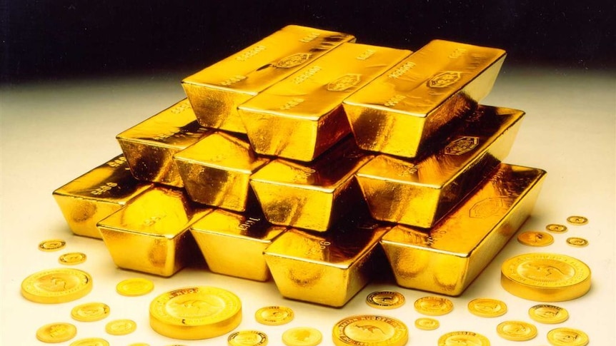 A bunch of gold bars and coins. 