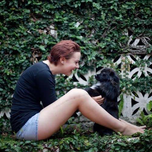 Cancer survivor Jasmine with her dog