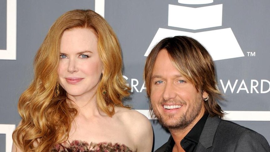 Urban, with his wife Nicole Kidman, won the best male country vocal performance award.