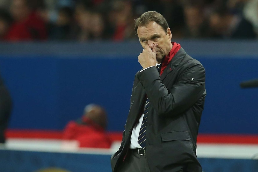 A dejected Socceroos coach Holger Osieck