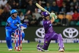Tim Paine hits a six during the BBL