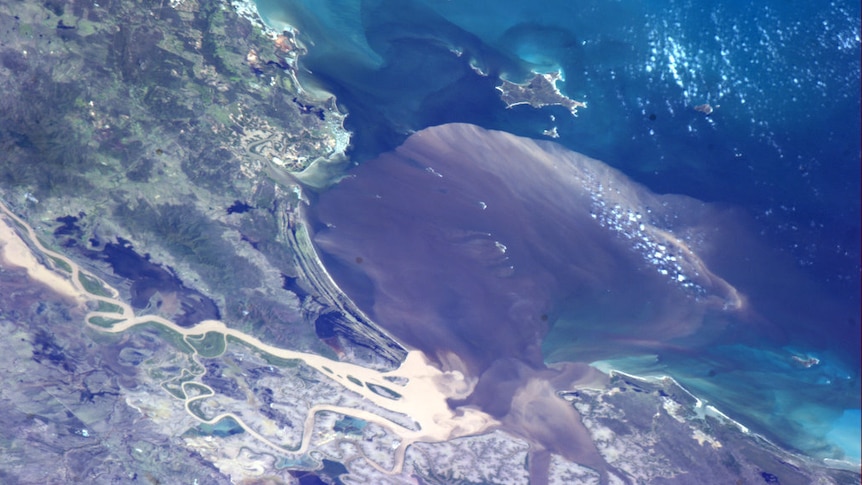 Flood waters entering the Coral Sea near Rockhampton