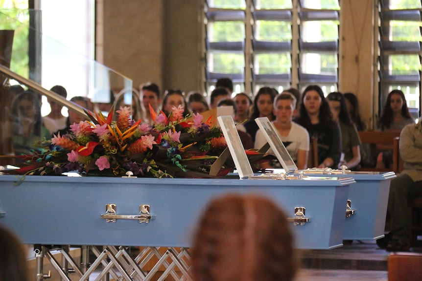 The funeral of Rhys Walters and Rhys Simlesa