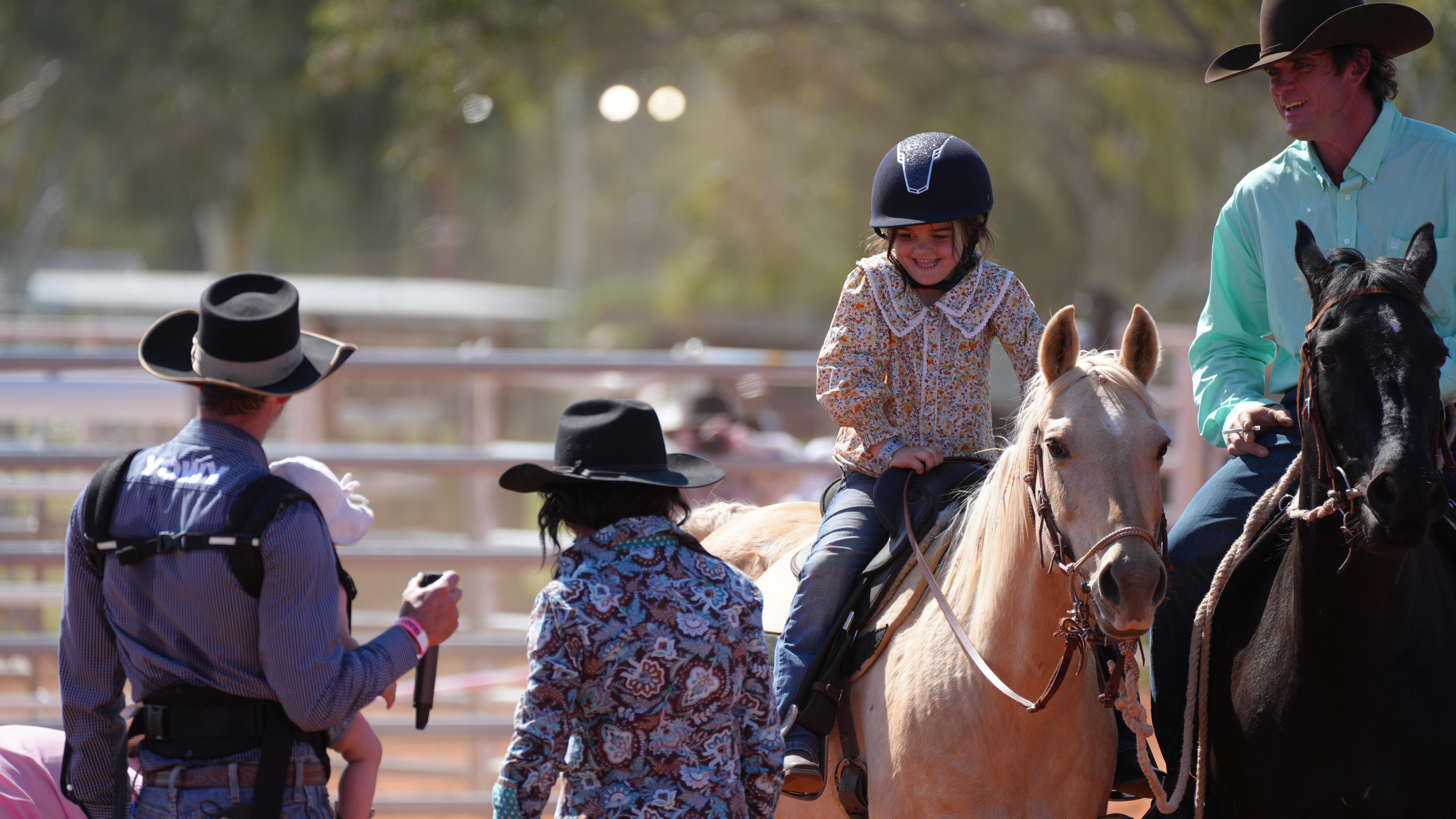 A young girl on horseback