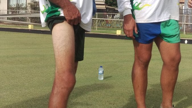 Shayne Barwick shows off his tan after 71.5 hours on the bowling green.