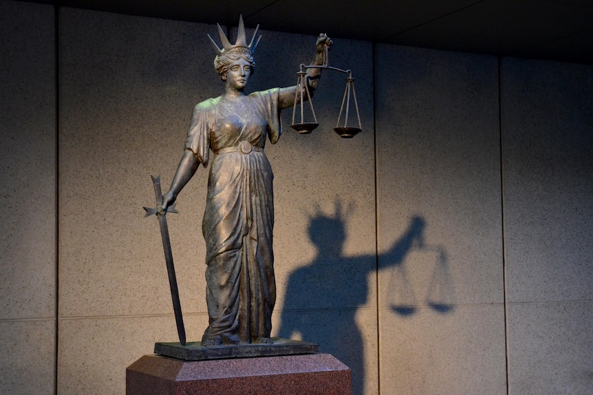 The Scales of Justice outside the Supreme Court in Brisbane.