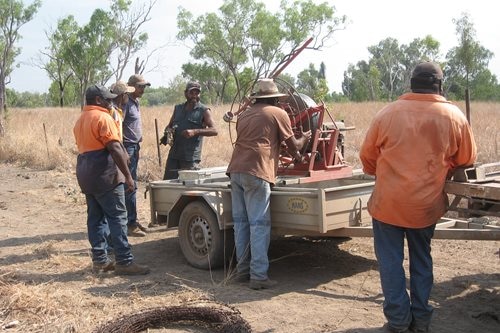 Bulimba trainees and workers completing fencing.