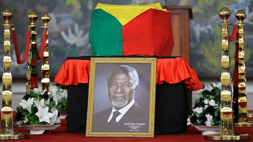 A portrait of former UN secretary-general Kofi Annan rests against his flag-draped coffin.