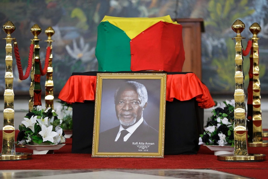A portrait of former UN secretary-general Kofi Annan rests against his flag-draped coffin.
