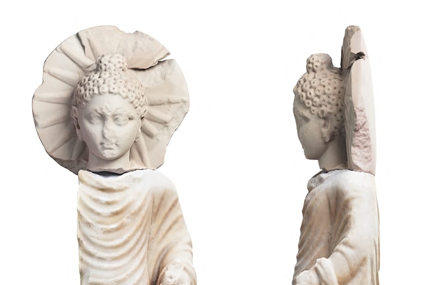 A front and side view of a white buddha like statue