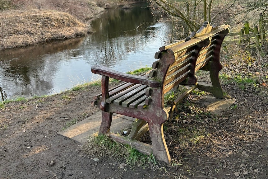 A bench next to the River Wyre