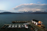 General view of a small harbour and snow-capped mountains in Bals-Fiord, north of the Artic Circle