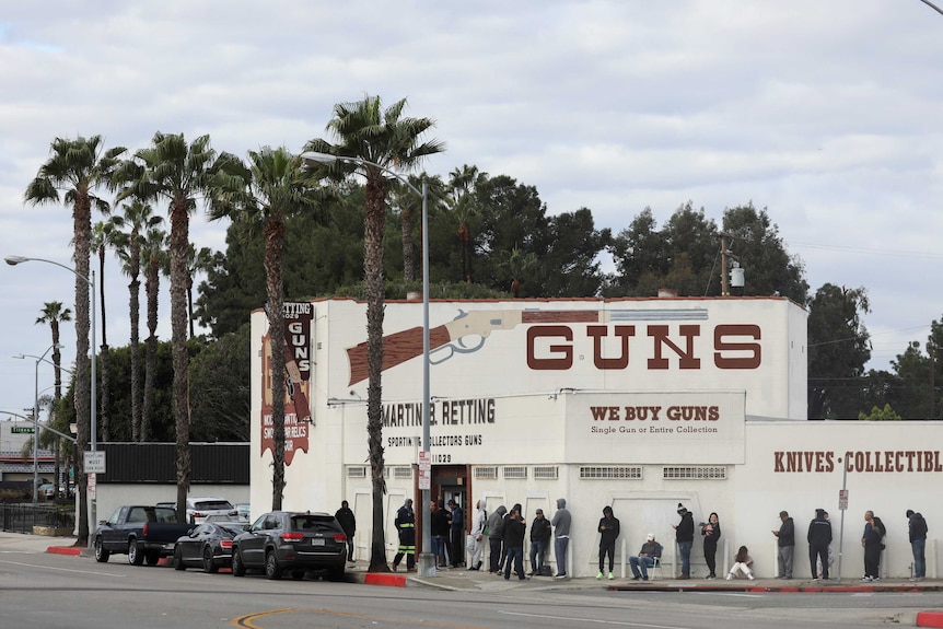 A long line of people outside a gun shop in California