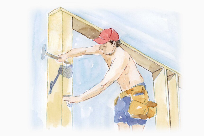 Young man wearing a red hat and no shirt holds a hammer while building a house frame.