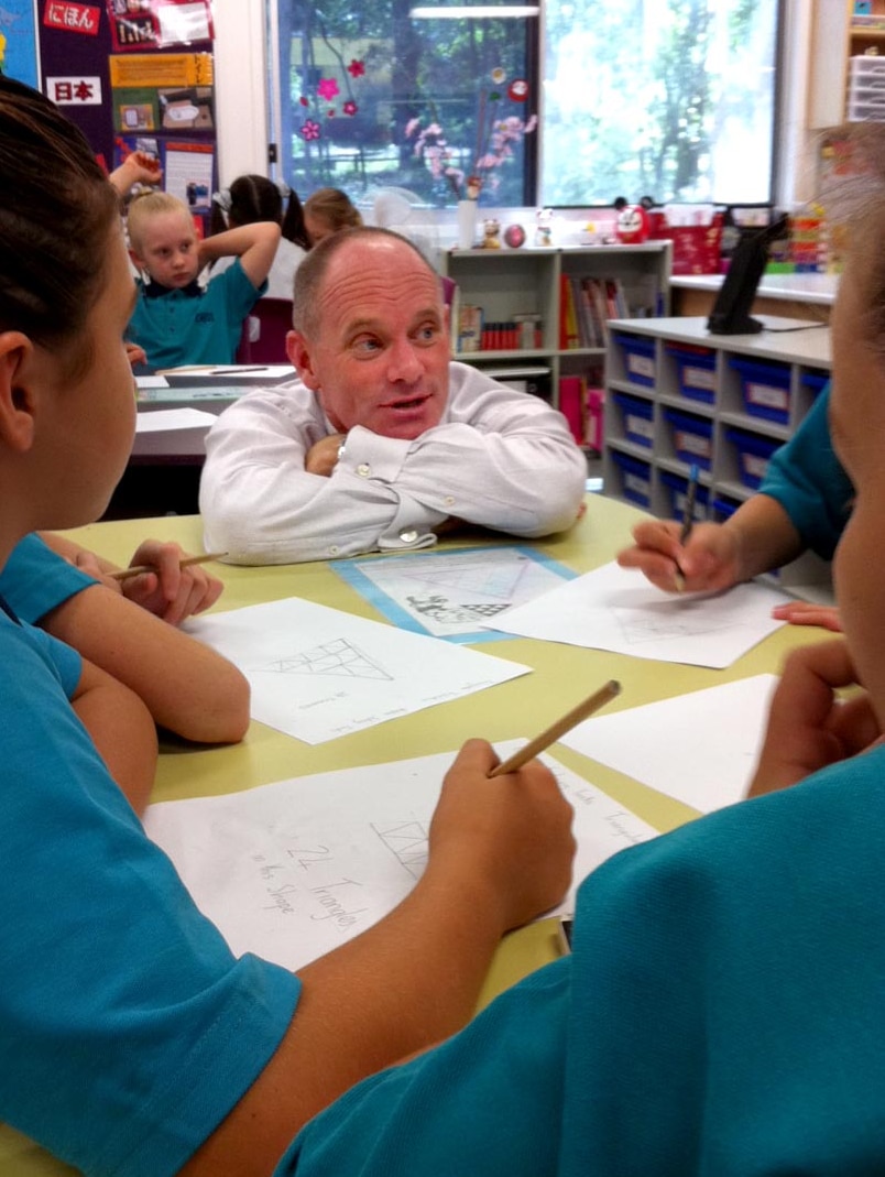 Mr Newman talks with students at Chatswood Hills State School in Logan on March 16.