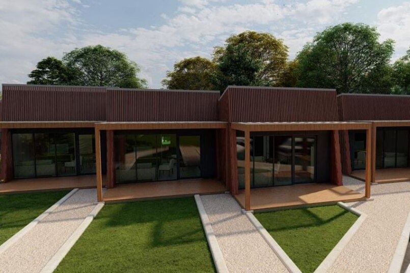 A ground level artists impression of a timber clad small-houses 