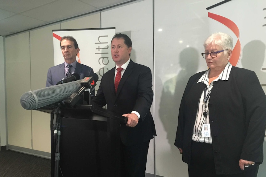 SA Health chief executive David Swan with Health Minister Jack Snelling and Vickie Kaminski.