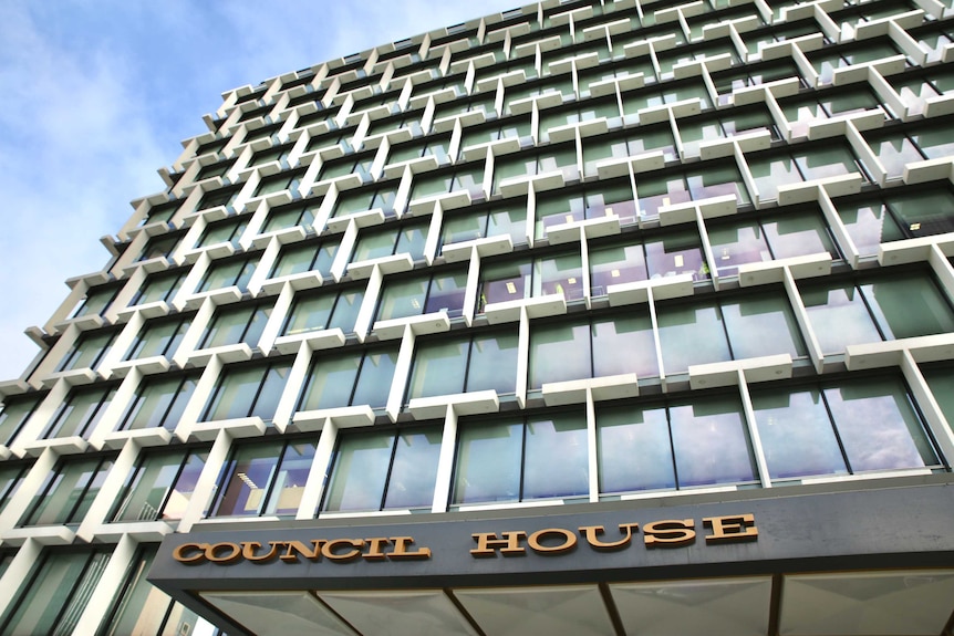 A low angle looking up at the Council House building in Perth.