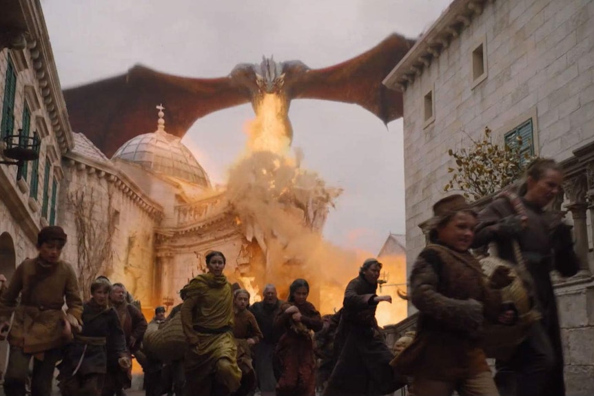 Civilians flee as Drogon burns the city.