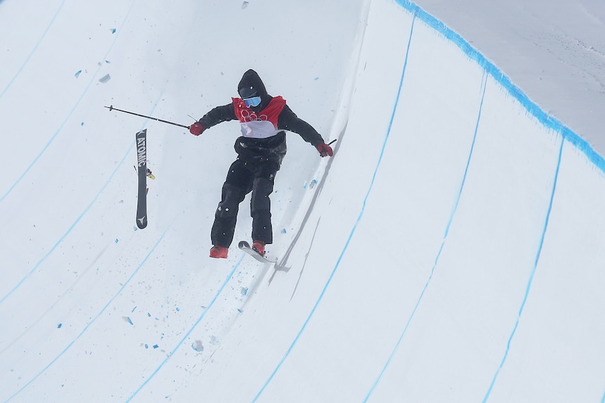 A British skier crashes during a halfpipe event at the Beijing Winter Olympics.