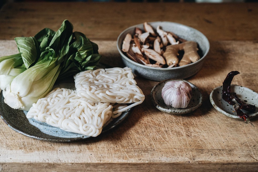 Bok choy, udon noodles, mushrooms, garlic, chilli and ginger are pantry ingredients of this vegetarian soup.