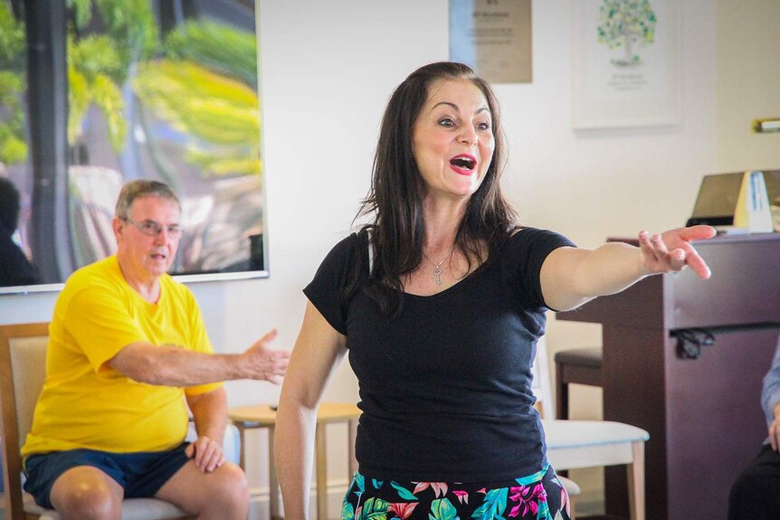 Dance teacher Gwen Korebrits leads a dance class for the elderly and people with a disability on Queensland's Sunshine Coast.