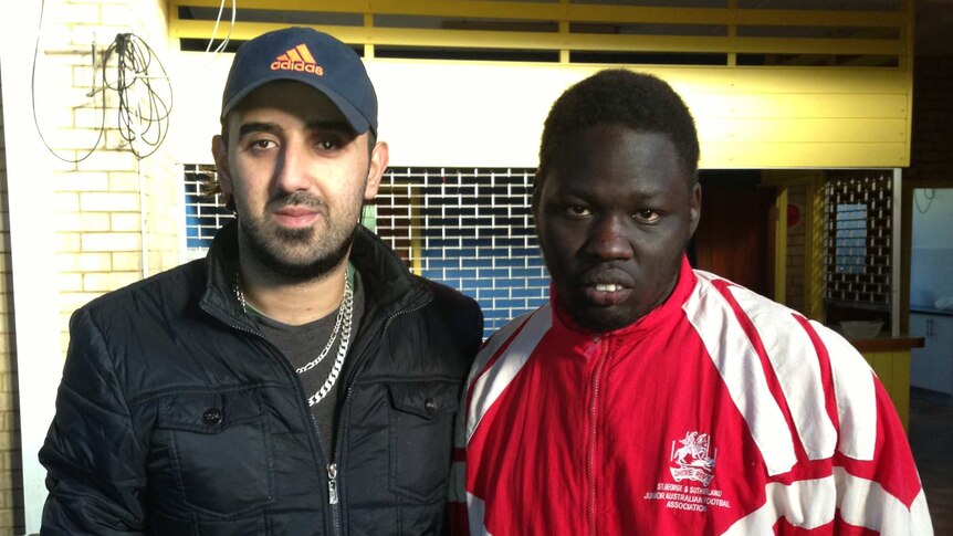 Gokhan Sengic, youth worker, Auburn Youth Centre with 23-year old Deng from South Sudan