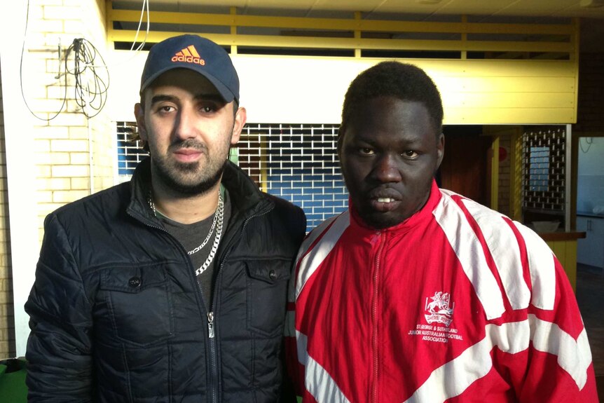 Gokhan Sengic, youth worker, Auburn Youth Centre with 23-year old Deng from South Sudan