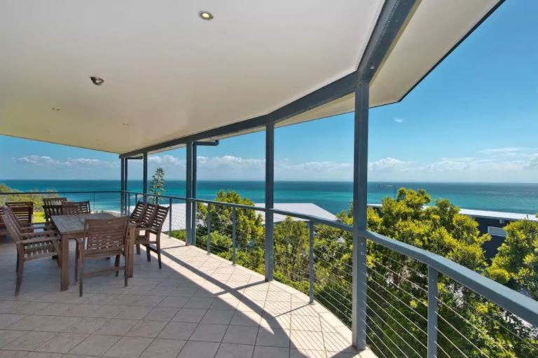 The verandah and view from Drew Wilson's Tangalooma beach house.