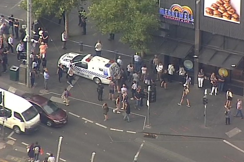 An aerial image shows a police van outside Melbourne's Crown casino.