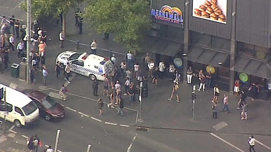 An aerial image shows a police van outside Melbourne's Crown casino.